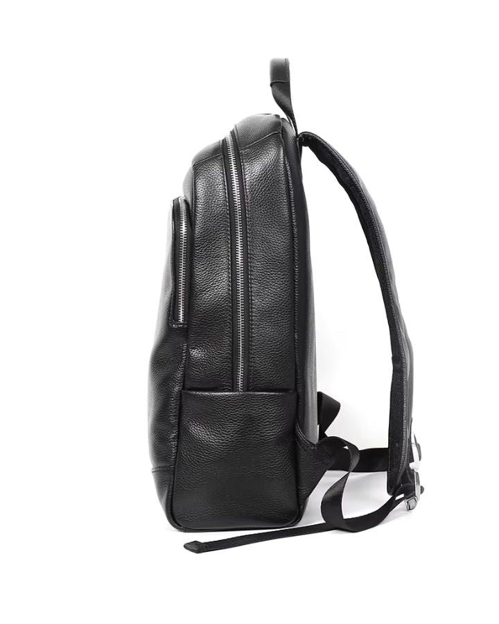 Petit sac à dos en cuir véritable pour homme, vue de profil avec poche zippée