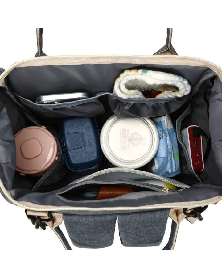 intérieur spacieux d’un sac à dos à langer oxford organisé avec biberons couches et accessoires pour bébé