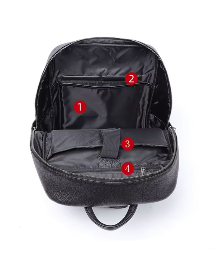 Sac à dos design en cuir véritable homme, vue d'intérieur avec multiples poches et compartiments internes