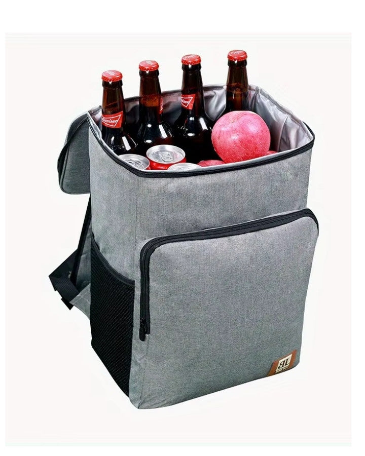 Sac à dos homme isotherme gris rempli de boissons et fruits, idéal pour repas à emporter